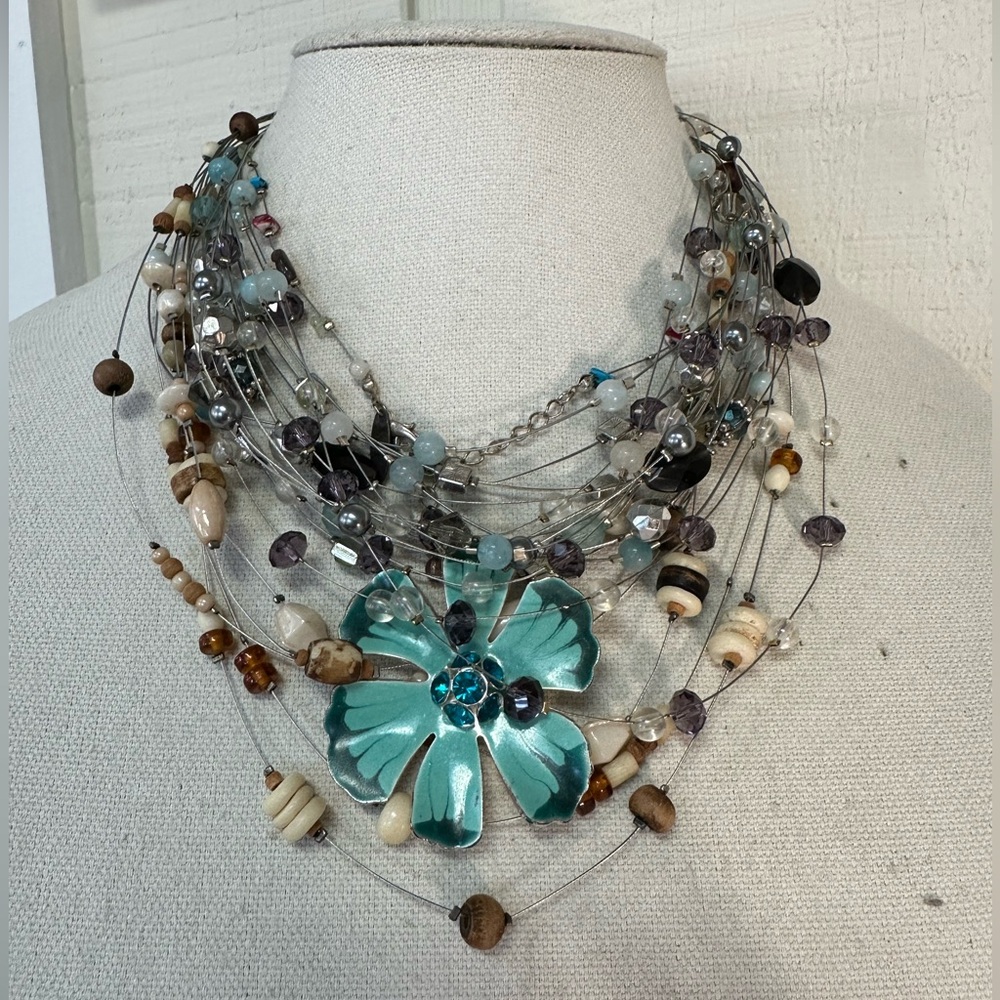 Nine infinity vibe necklaces in many colors